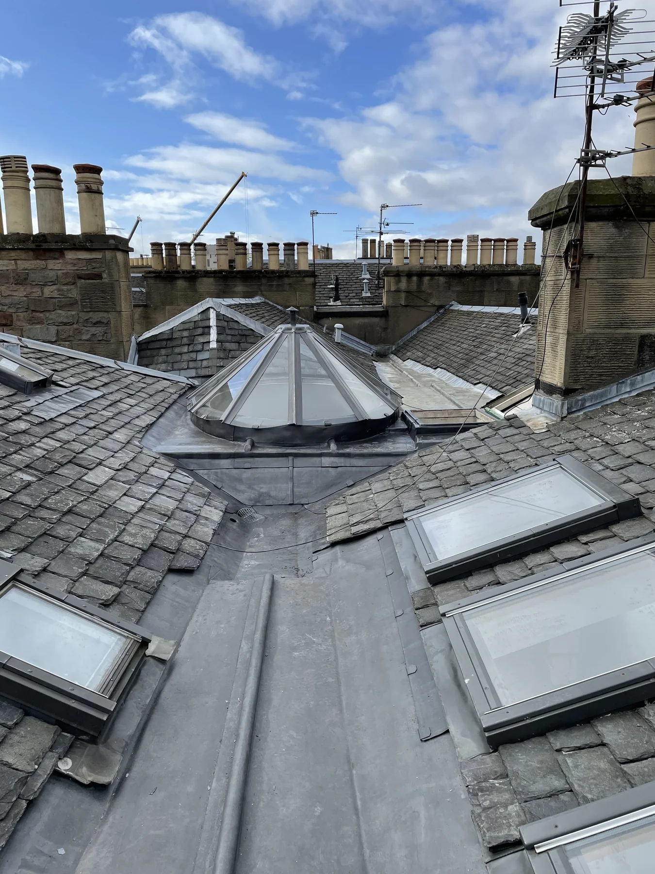 Lead-lined box gutter and roof cupola between slated roof slopes at Atholl Place, Edinburgh